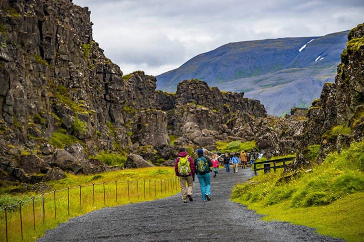 Thingvellir national park, Thingvallavatn huge tectonic plates drifting cracks and tourists on Iceland