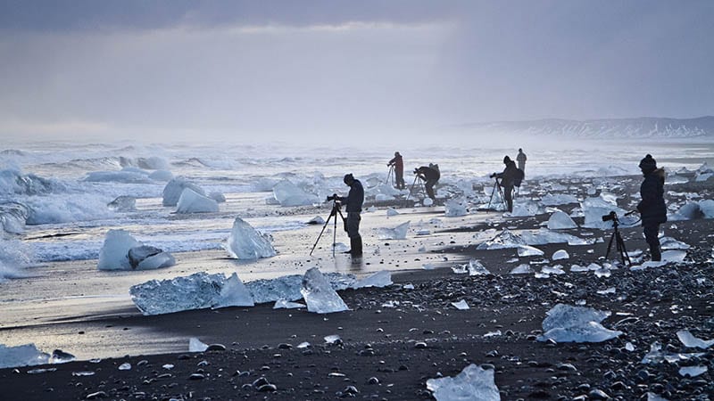 Photographers photographing the diamond beach