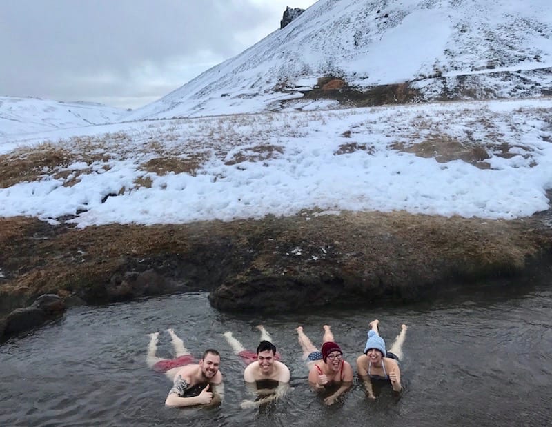4 people enjoying Reykjadalur hot river