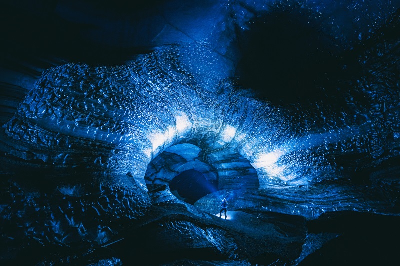 person inside katla ice cave