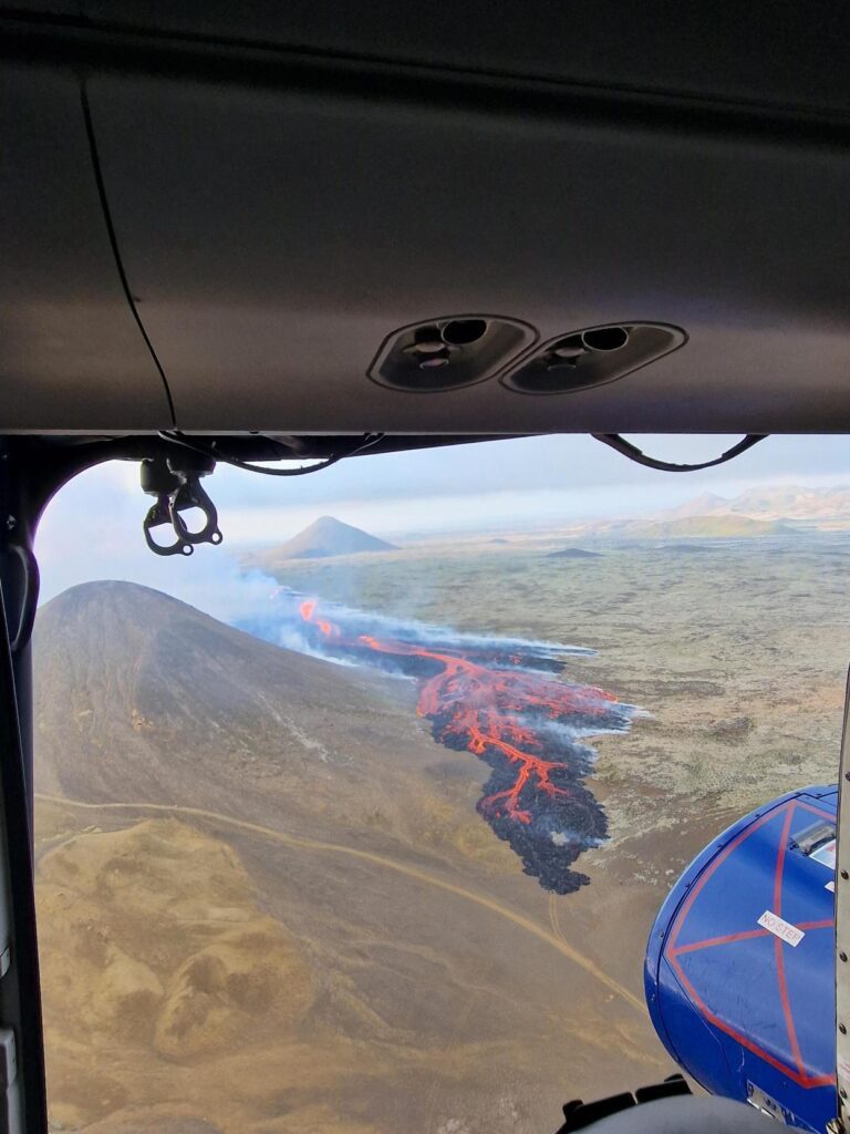 photo  of a fresh lava field next to Department of Litli Hrútur Volcano taken from a helicopter