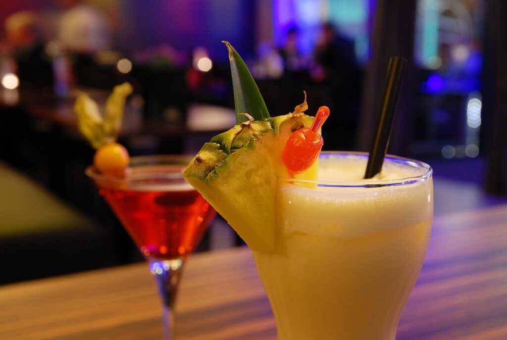 A couple of cocktails in a cocktail bar